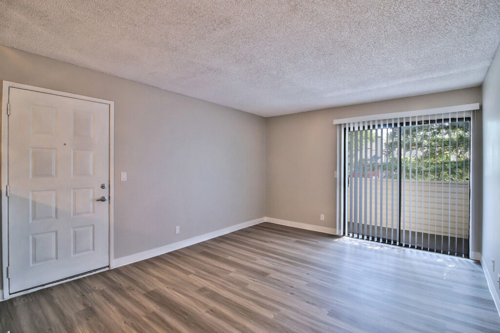 Living room with sliding doors to patio/balcony